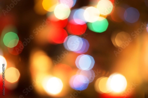 Fototapeta Christmas lights background, abstract colorful background with bokeh glitter of colorful light