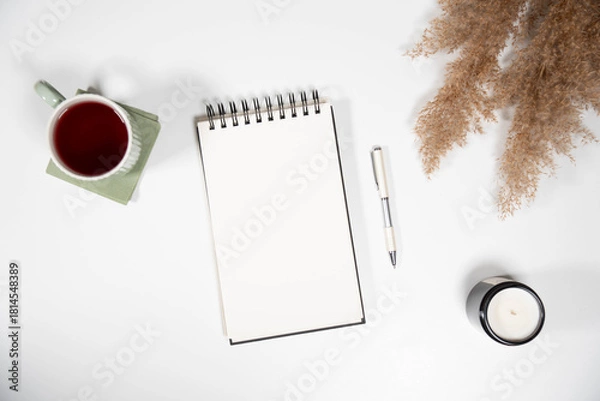 Obraz Aesthetic flat lay featuring a blank sketchbook, dried pampas grass, candle, and tea. Perfect for lifestyle blogging, journaling, or wedding planning mockups.