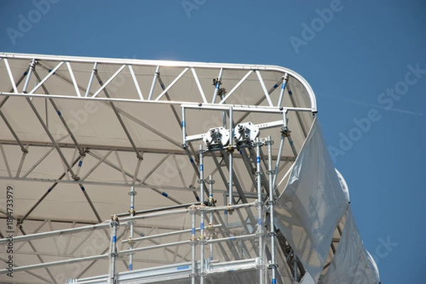 Fototapeta Scaffolding on the roof of a construction site to protect workers from the sun's rays and heat, Rome, Italy.