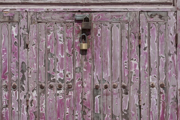 Obraz Two rusty padlock locking a wooden door