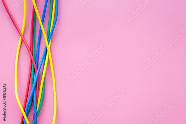 Fototapeta Network colored cables for computer on pink background top view copyspace