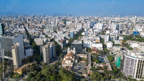 Fototapeta Drone view of the extensive and modern capital city of Lima in the touristic district of Miraflores.