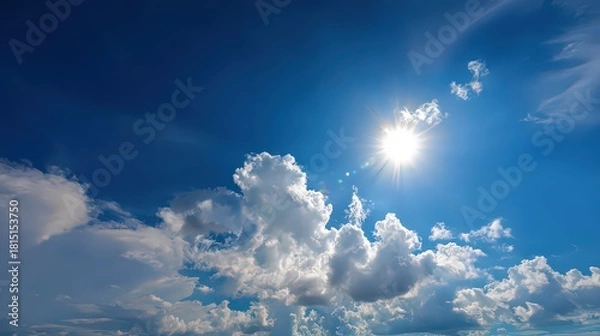 Obraz Bright Sunlight Shining Through Cumulus Clouds on a Deep Blue Sky during Daytime