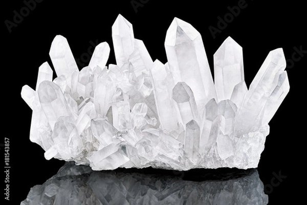 Fototapeta Pure Quartz Crystal cluster isolated on black background. Natural translucent crystal stone surface macro closeup. Macro of beautiful rare mineral stone