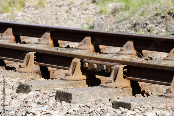 Obraz Metal railway track rails and concrete sleepers