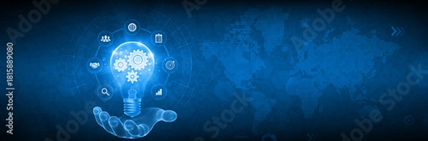 Obraz Innovation and global business strategy concept with digital hand holding a glowing lightbulb containing gears, icons for success, and world map background on blue technology interface.