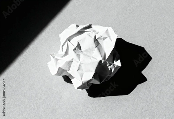 Obraz Single crumpled white paper ball on grey background with hard shadow, idea rejection concept