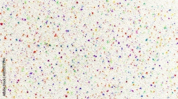 Fototapeta A vibrant, textured surface with an array of colorful specks scattered across a light background, resembling confetti or a playful artistic design.