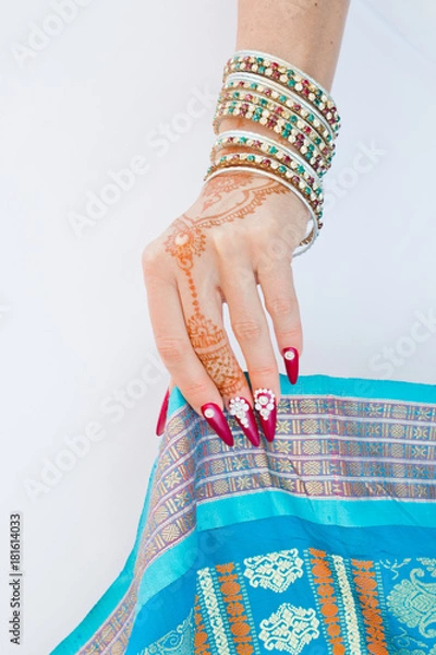 Obraz nails decorated with brilliant and hand with henna tattoos