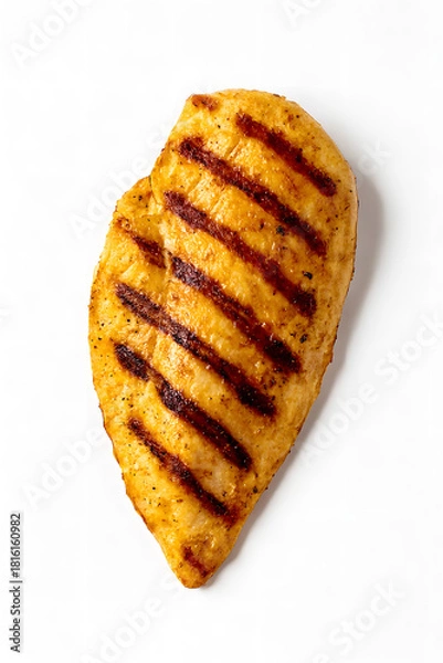 Fototapeta Grilled Chicken Breast: A mouthwatering shot of a perfectly grilled chicken breast, showcasing sear marks and delicious texture