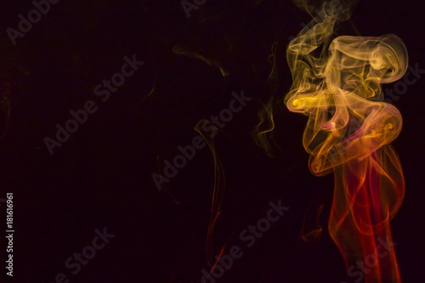 Fototapeta Colored smoke on black background