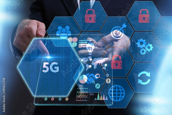 Obraz Business, Technology, Internet and network concept. Young businessman working on a virtual screen of the future and sees the inscription: 5G