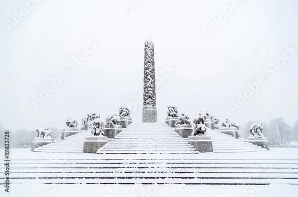 Fototapeta OSLO January 2015. Snow fall in Vigeland sculpture park or Vigelandpark in Oslo Norway. Vigeland is located in the Frognerpark in Oslo.
