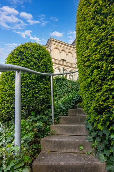 Fototapeta A tight view of stairs leading upward toward a building in Baden Baden
