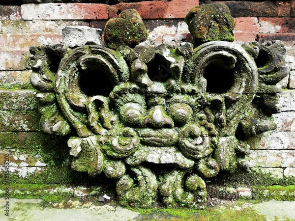 Fototapeta Traditional Balinese temple reliefs, in old condition