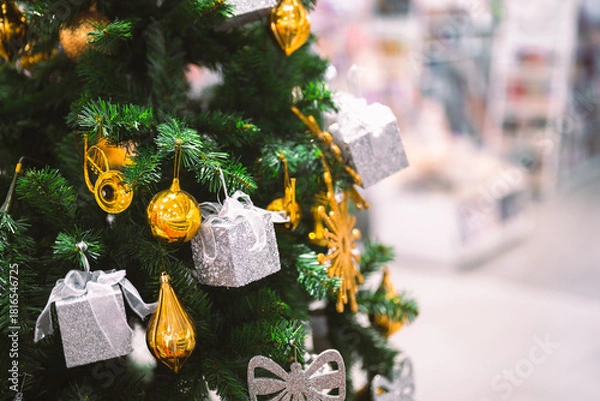 Obraz Closeup garland Christmas tree decoration,red,gold,silver ornament with bokeh background. Perfect holiday sales, winter celebration, festive seasonal promotions, marketing, shopping with copy space