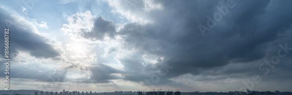 Obraz Sun rays through dramatic clouds