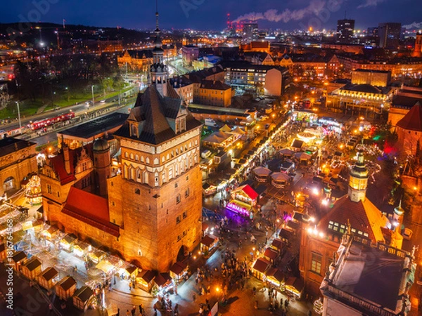 Fototapeta Beautifully lit Christmas market in the Main City of Gdansk at dusk. Poland
