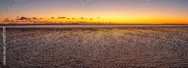 Fototapeta Letztes Licht über der Nordsee als Panoramaaufnahme
