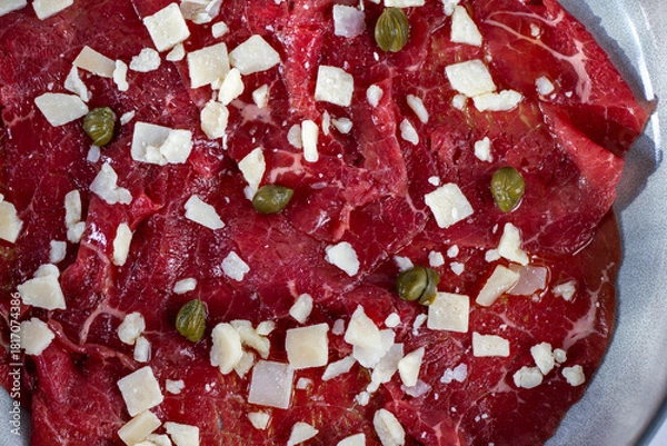 Obraz Beef Carpaccio cold appetizer with parmesan