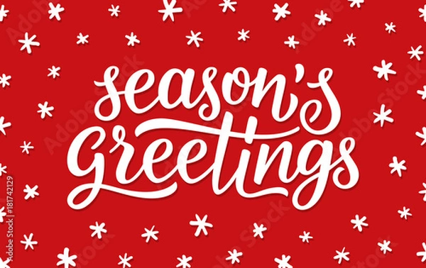 Fototapeta Seasons greetings calligraphy lettering text on red background with white doodle snowflakes. Retro greeting card for Christmas and New Year holidays. Vector background