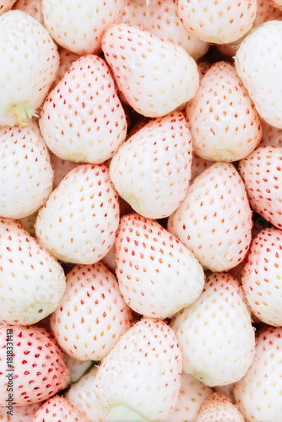Fototapeta Fresh white strawberries arranged in close up view, showcasing their unique pale color and delicate texture. image evokes sense of freshness and sweetness, perfect for culinary use
