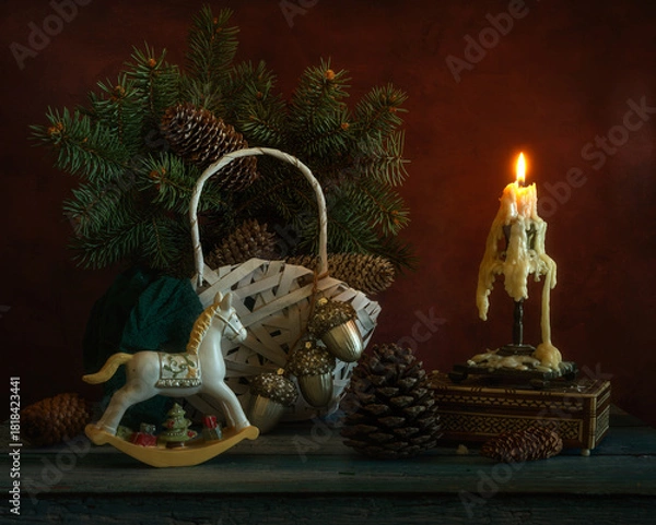 Fototapeta Burning candles create a festive mood. In anticipation of Christmas and New Year.