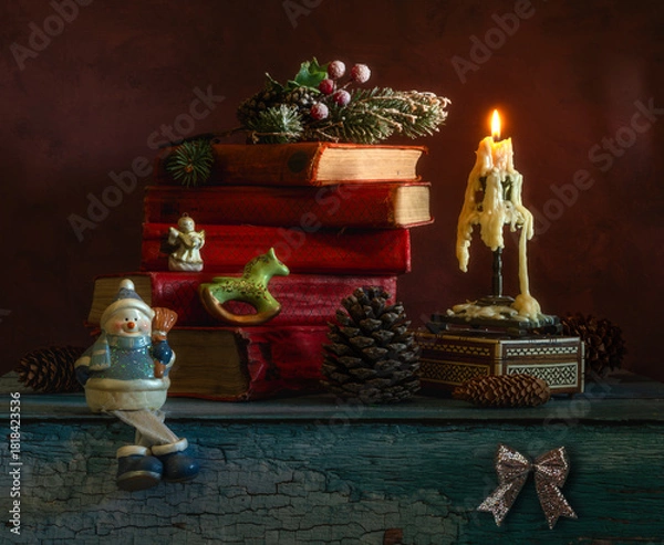 Obraz Burning candles create a festive mood. In anticipation of Christmas and New Year.