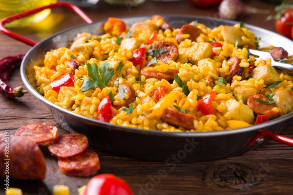 Obraz Traditional Spanish Paella with chicken.