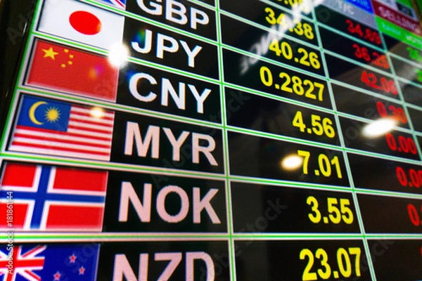 Fototapeta Currency exchange rate on digital display in airport