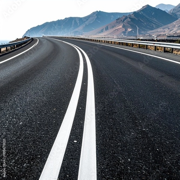 Fototapeta Highway curves into distant mountains