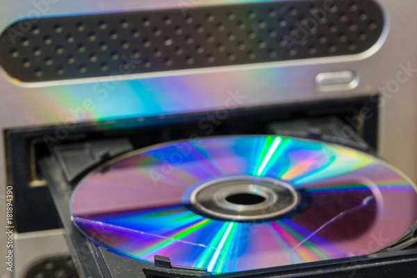 Fototapeta Scratch on the disk. The scratch disk in the optical drive of the computer.