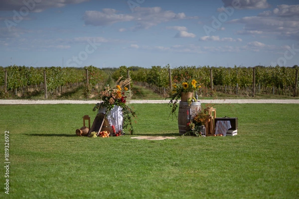 Obraz Rustic Outdoor Wedding Setup in Vineyard With Floral Decorations