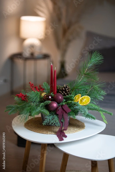 Obraz Christmas arrangements with candles and fir branches. Xmas decorations.