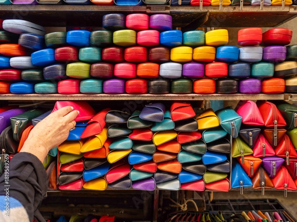 Fototapeta A large selection of colorful spectacle cases. The cases have different closure types.