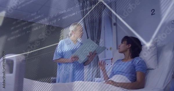 Fototapeta Explaining nurse in scrubs holding blue chart, consulting patient in blue gown on bed near monitor