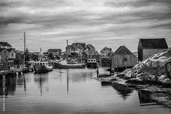 Fototapeta Charming fishing village on the rugged coast of Nova Scotia, capturing the essence of maritime life with its iconic scenery.