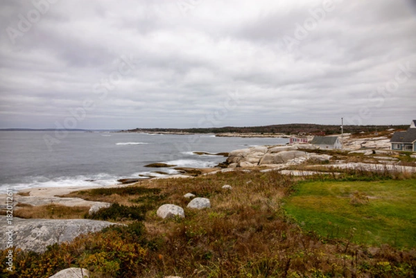 Fototapeta Charming fishing village on the rugged coast of Nova Scotia, capturing the essence of maritime life with its iconic scenery.