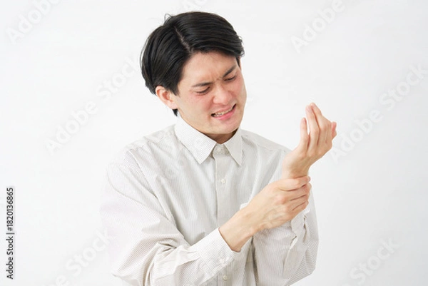 Obraz 男性　けんしょう炎　白背景