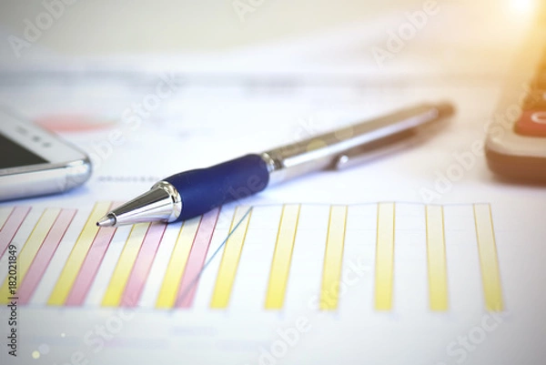 Fototapeta Review accounting data and calculate production income.