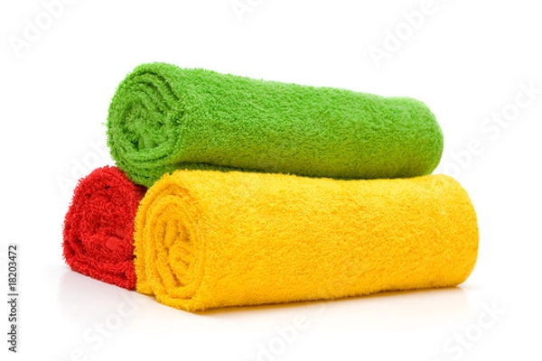 Fototapeta Colorful towels isolated on white background