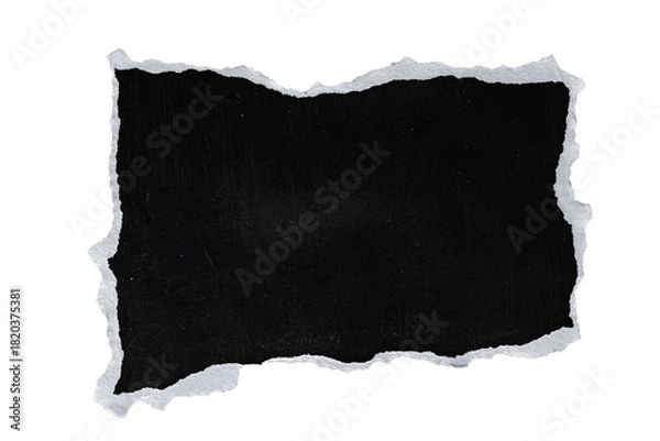 Fototapeta Isolated black torn paper with rough edges against a black background creating a frame