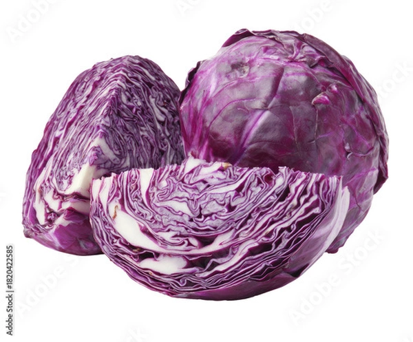 Fototapeta Vibrant red cabbage halves and wedge showcasing layers