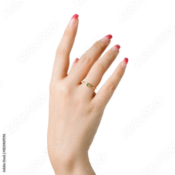 Obraz A delicate feminine hand showcasing a gold ring with green gemstone, isolated on white background in clean PNG style for product or jewelry design.