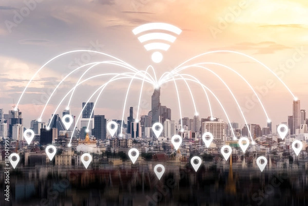 Fototapeta The abstract image of the cityscape overlay with networking virtual hologram during sunset. The concept of modern life, communication, business, city life and internet of things.