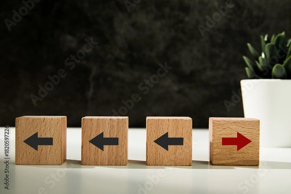 Fototapeta New ways of working, differentiation strategy concept symbol on wood blocks. Providing uniqueness, different and distinct from competitors, creating competitive advantage. Business direction concept.