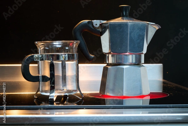 Fototapeta Italian moka coffee maker on Stove