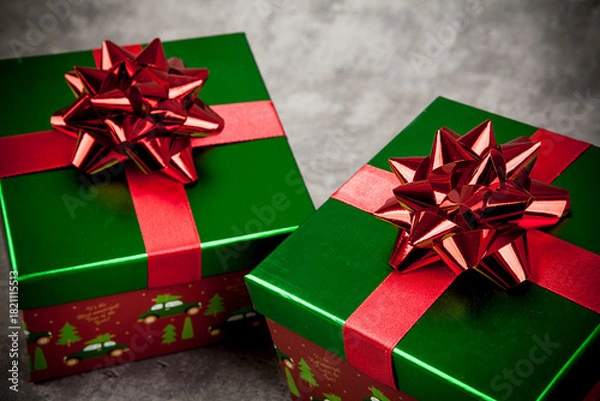 Obraz Christmas shiny gift box with a bow on a rustic background