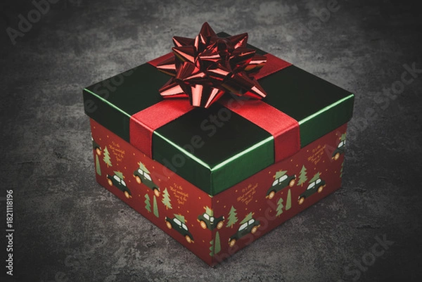 Obraz Christmas shiny gift box with a bow on a rustic background