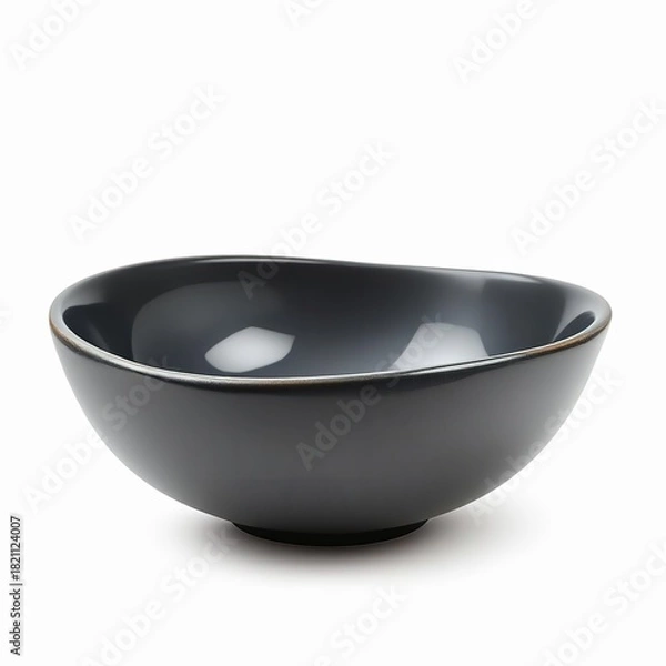 Fototapeta Small, dark gray ceramic bowl with a slightly irregular rim, isolated on white background
